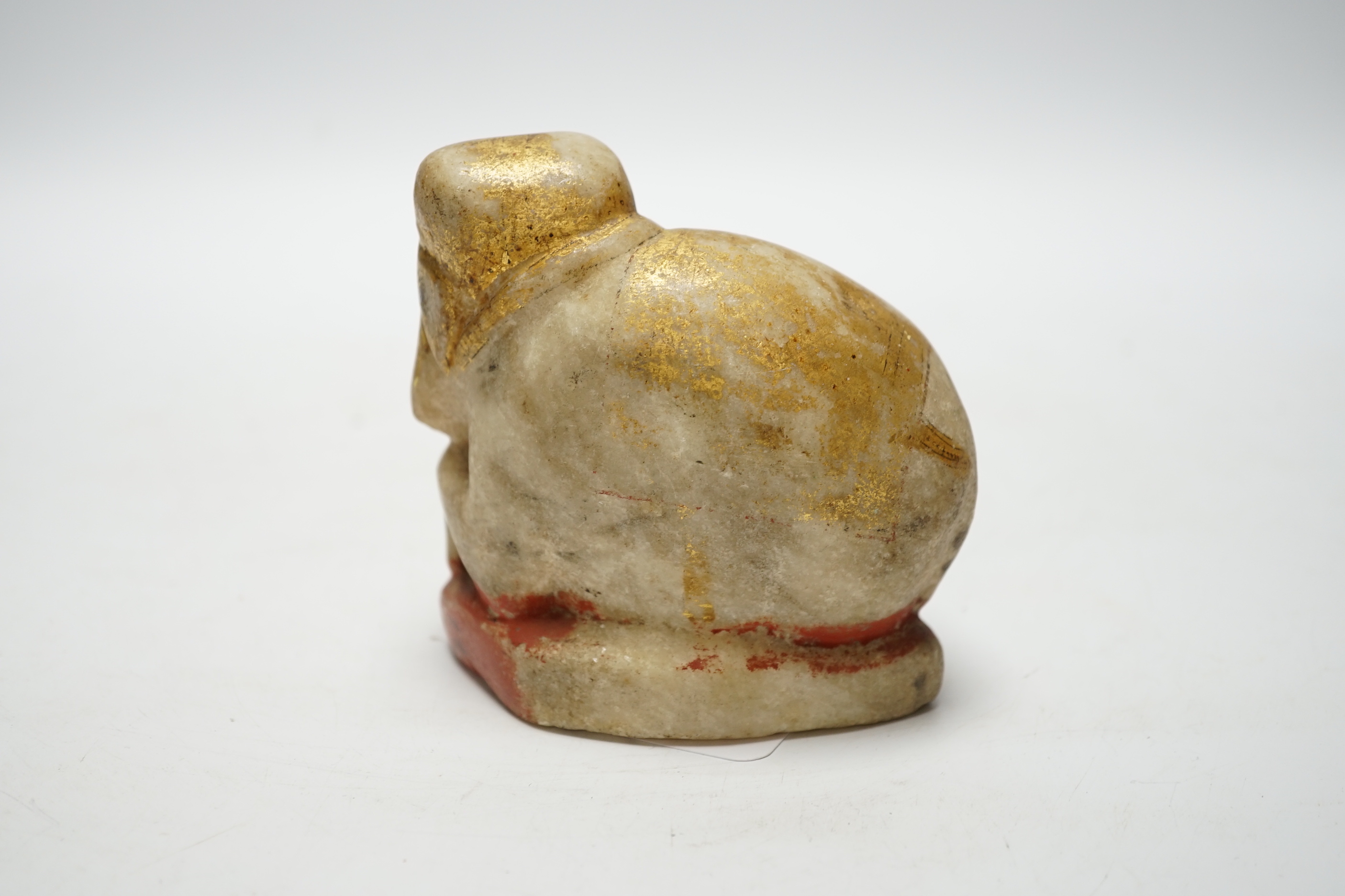 An Indian carved and painted alabaster model of an elephant, 10cm tall